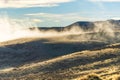 Amazing view of golden sunlight shinning on sea of fog and cloud above the golden yellow dried glass hill in autumn south