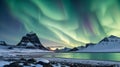 Amazing view of green aurora borealis shining in night sky over snowy mountain mountain in background in iceland Royalty Free Stock Photo