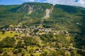 Amazing view of the hillside village and green slopes of the Swiss Alps. Colorful summer view of village. Idyllic Royalty Free Stock Photo