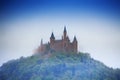 Amazing view of Hohenzollern castle in haze Royalty Free Stock Photo