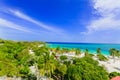 Amazing view of Holguin province tropical inviting beach and tranquil azure turquoise ocean on blue sky background