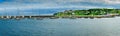 Amazing view at Howth marina bay near Dublin, Ireland with yachts and boats. green mountains in the background