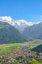 Amazing view of Interlaken and adjacent mountains photographed from the top of Harder Kulm in Switzerland. Swiss Alps landscape. Royalty Free Stock Photo