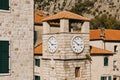 Amazing view of Kotor old city and the clock tower in a sunny day. Travel destination in Montenegro Royalty Free Stock Photo