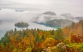 Amazing view of Lake Bled at foggy autumn morning Royalty Free Stock Photo