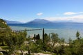 Amazing view of Lake Garda from the hills of the park Parco Pubblico Tomelleri in Sirmione town, Italy Royalty Free Stock Photo