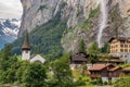 Amazing view of Lauterbrunnen town in Swiss Alps valley with beautiful Staubbach waterfalls in the background, Switzerland Royalty Free Stock Photo