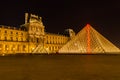 Amazing view of Louvre Museum at night in Paris France