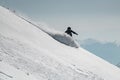 amazing view on male skier slides down the snow-covered slope. Freeride skiing concept Royalty Free Stock Photo