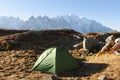 Amazing view on Monte Bianco mountains range with green tent Royalty Free Stock Photo