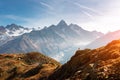 Amazing view on Monte Bianco mountains range with tourist on a foreground Royalty Free Stock Photo