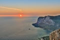 Amazing view from the mountain peak on rocks, colorful sky and sea in the evening. Mountain landscape at sunset. Nature Royalty Free Stock Photo