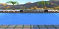 Amazing view of the mountains illuminated by the setting sun. Spacious blue water swimming pool. Comfortable sun loungers and a