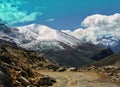 Amazing view of the narrow mountain roads passing through the mountain range Royalty Free Stock Photo