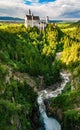 Amazing view on Neuschwanstein Fairytale Castle, canyon of Pollat river and waterfall, Bavaria, Germany Royalty Free Stock Photo