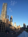 Amazing view at the New York City Brooklyn Bridge in Manhattan with skyscrapers and city skyline over Hudson River winter Royalty Free Stock Photo