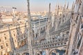 Amazing view of old Gothic spires. Milan Cathedral roof on sunny day, Italy. Milan Cathedral or Duomo di Milano is top Royalty Free Stock Photo