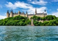 parliament hill surrounded by green forest ai