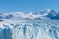 Amazing view of Perito Moreno glacier, blue ice burg glacier from peak of the mountain through the aqua blue lake in Los Glaciares