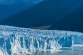 Amazing view of Perito Moreno glacier, blue ice burg glacier from peak of the mountain through the aqua blue lake in Los Glaciares