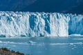 Amazing view of Perito Moreno glacier, blue ice burg glacier from peak of the mountain through the aqua blue lake in Los Glaciares