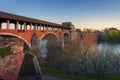 amazing view of Ponte Coperto Pavia (covered bridge) at sunset Royalty Free Stock Photo