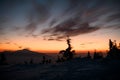 Amazing view of silhouettes of mountains and low clouds at colorful sunrise Royalty Free Stock Photo