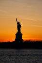 Amazing view of the Statue of Liberty, at sunset Royalty Free Stock Photo