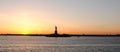 Amazing view of the Statue of Liberty, at sunset Royalty Free Stock Photo