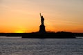 Amazing view of the Statue of Liberty, at sunset Royalty Free Stock Photo