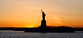 Panoramic view of american icon Statue of Liberty, at sunset Royalty Free Stock Photo