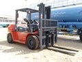 forklift. Steel Structural fabrication workshop. column and beams. Muscat, Oman.