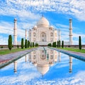 Amazing view on the Taj Mahal in sun light with reflection in wa Royalty Free Stock Photo