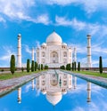 Amazing view on the Taj Mahal in sun light with reflection in wa Royalty Free Stock Photo