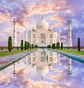 Amazing view on the Taj Mahal in sunset light with reflection in Royalty Free Stock Photo