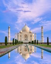 Amazing view on the Taj Mahal in sunset light with reflection in water. The Taj Mahal is an ivory-white marble mausoleum on the Royalty Free Stock Photo