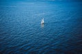 Amazing view to Yacht sailing in open sea at windy day. Drone view - birds eye angle. Yachting theme. Royalty Free Stock Photo