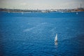 Amazing view to Yacht sailing in open sea at windy day. Drone view - birds eye angle. Yachting theme. Royalty Free Stock Photo