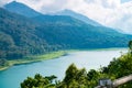 Amazing View of Twin Lakes surrounded by hills, mountains, tropical rain-forest and white clouds  in Bali, Indonesia Royalty Free Stock Photo