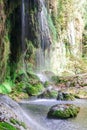 Amazing view on waterfall flowing from high mountain. Kursunlu Waterfall near to Antalya, Turkey Royalty Free Stock Photo