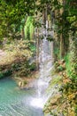 Amazing view on waterfall flowing from high mountain. Kursunlu Waterfall near to Antalya, Turkey Royalty Free Stock Photo