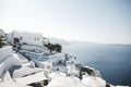 Amazing view of white houses in Oia town on Santorini island in Greece. Royalty Free Stock Photo