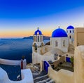 Amazing view with white houses in Oia village. Royalty Free Stock Photo