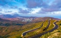 Amazing view of winding highway in the mountains Lanzarote. Location: Lanzarote, Canary Islands, Spain. Artistic picture. Beauty Royalty Free Stock Photo