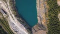 Amazing views over the trees and lakes during the Autumn season. Shot. Top view on Azure shore of a lake with forest Royalty Free Stock Photo