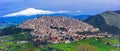 Amazing village Gangi with Etna volcano behind in Sicily, Italy