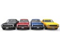 Amazing vintage American muscle cars in metallic red, black, blue and yellow