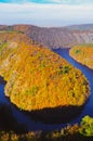 Amazing Vyhlidka Maj, Lookout Maj, near village Teletin, Czechia. Meander of the Vltava river surrounded by autumn forest viewed Royalty Free Stock Photo