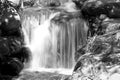 Amazing waterfall like fog around stones Royalty Free Stock Photo