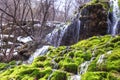 Amazing waterfall stream in forest, early spring. Nature landscape. Waterfall Siga. Homolje mountains Royalty Free Stock Photo